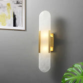 Wandlamp gouden binnenkant van witte marmer materiaal