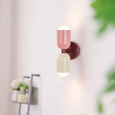 Wandlamp up-down binnen in roze kleur