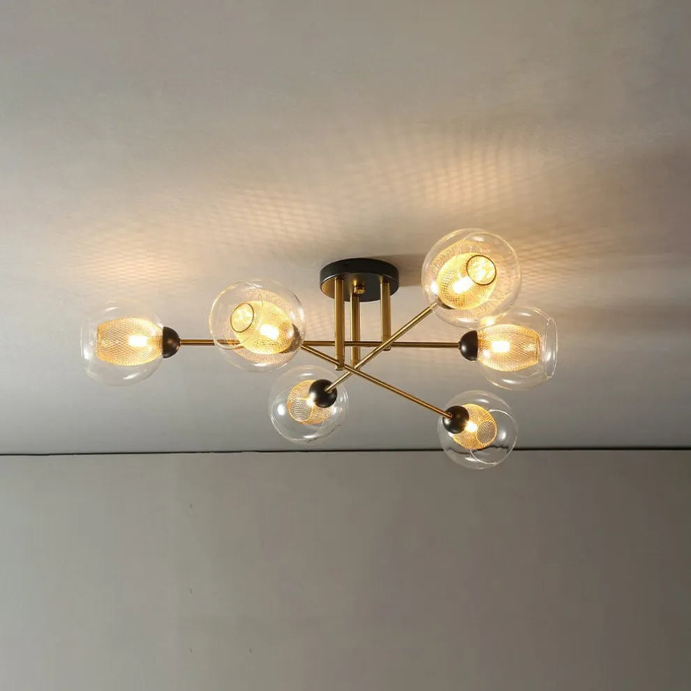 Kroonluchter glazen bollen gouden woonkamer