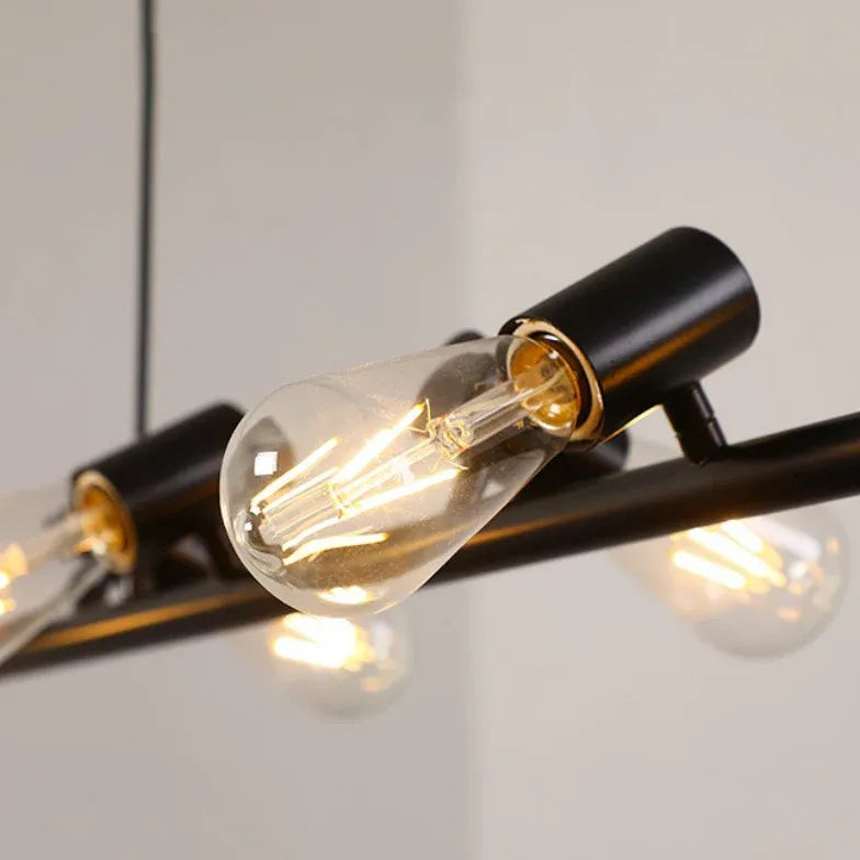 Eetkamer hanglampen zwarte langwerpige meerdere gloeilampen