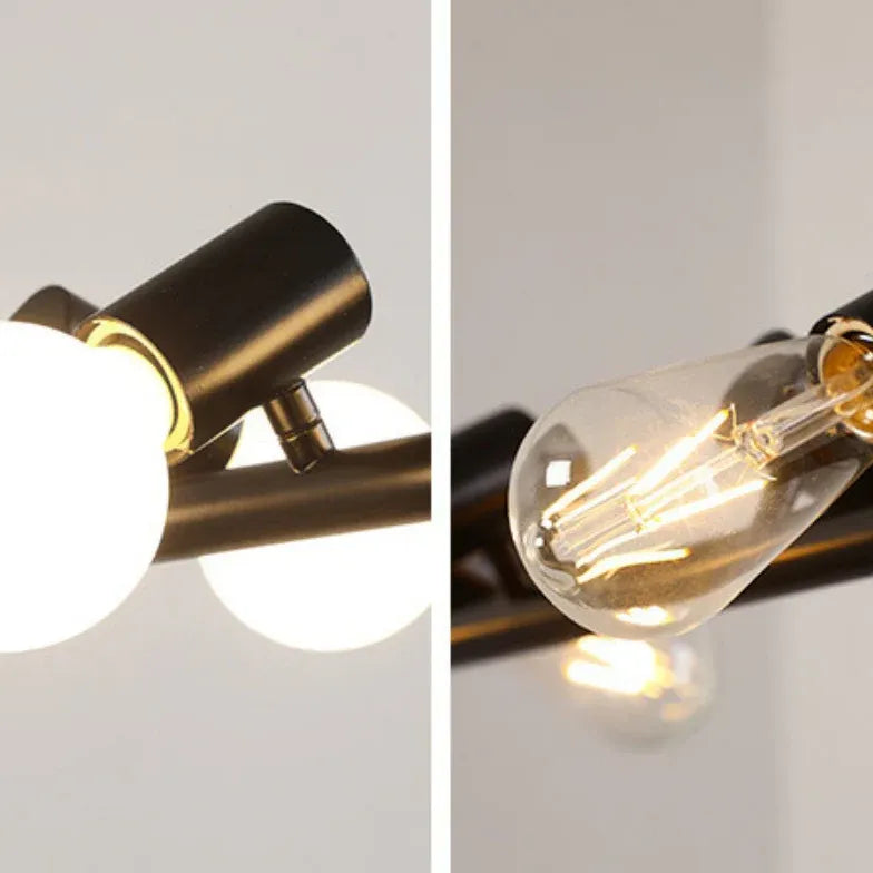 Eetkamer hanglampen zwarte langwerpige meerdere gloeilampen