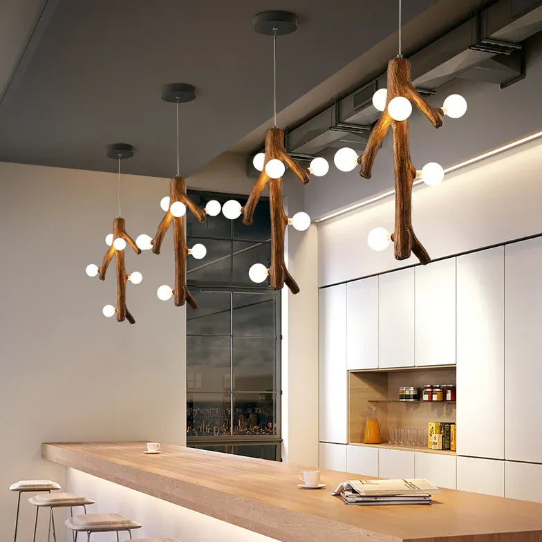 Eettafel hanglamp design in takkenvorm