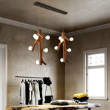 Eettafel hanglamp design in takkenvorm