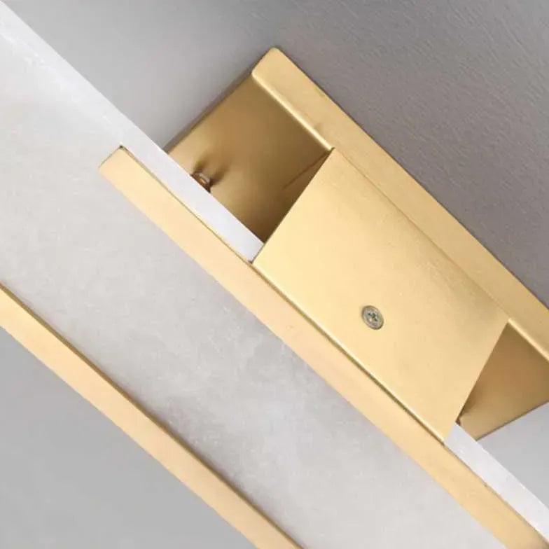 Wandlamp gouden binnenkant van witte marmer materiaal