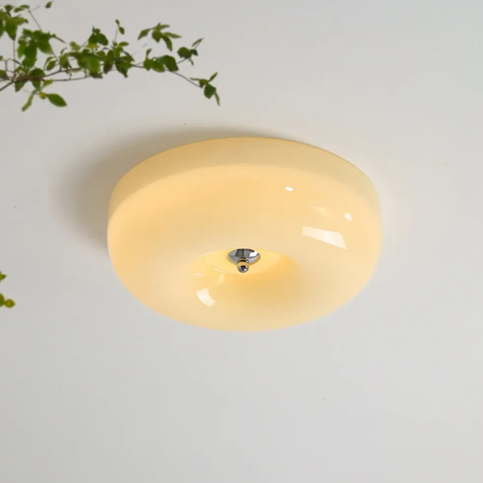 Gele glazen hanglamp rond dimbaar