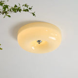 Gele glazen hanglamp rond dimbaar