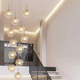 Gouden hanglamp met 10 glazen bollen