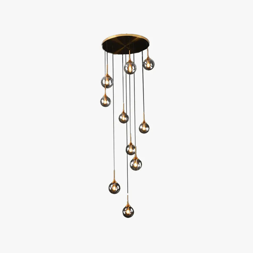 Gouden kroonluchter modern met bolvormige metalen ringen