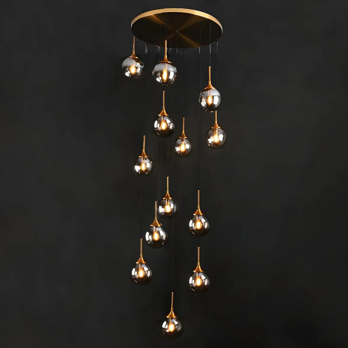 Gouden kroonluchter modern met bolvormige metalen ringen