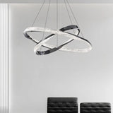 Hanglamp koperkleurig gekruiste ring woonkamer
