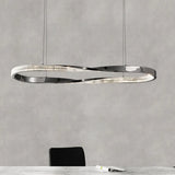 Hanglamp koperkleurig gekruiste ring woonkamer