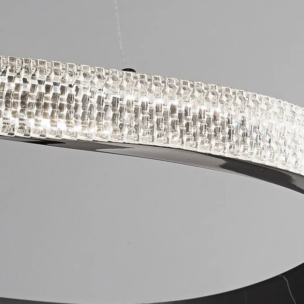 Hanglamp koperkleurig gekruiste ring woonkamer