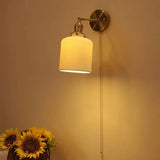 Wandlamp in koperen kleur met schakelaar