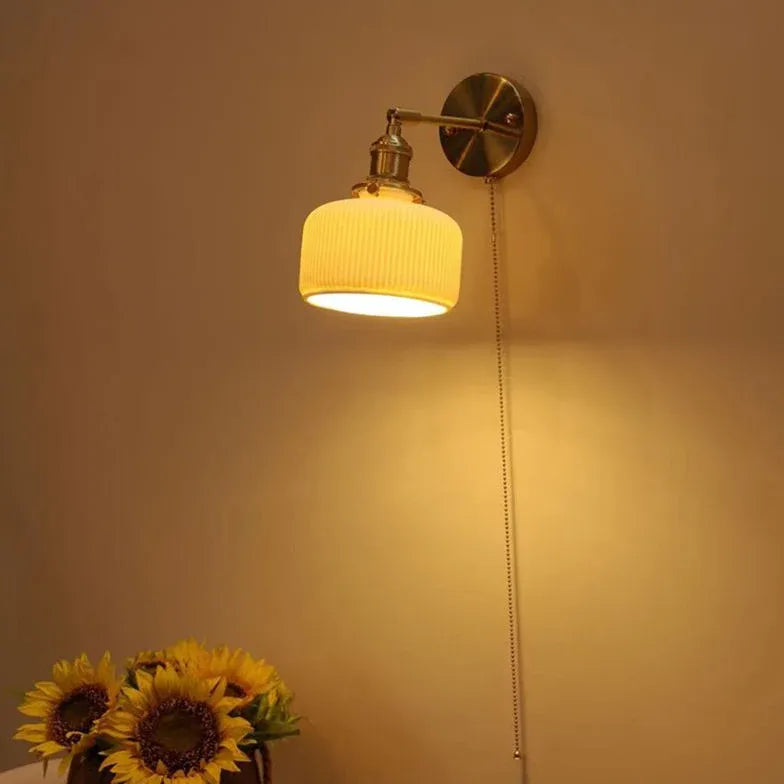Wandlamp in koperen kleur met schakelaar