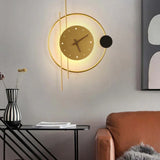 Ronde wandlamp goud klokvormig woonkamer