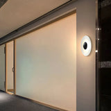 Buiten wandlamp wit metalen schijf