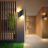 Zwart gouden wandlamp voor buiten met spiraalvorm