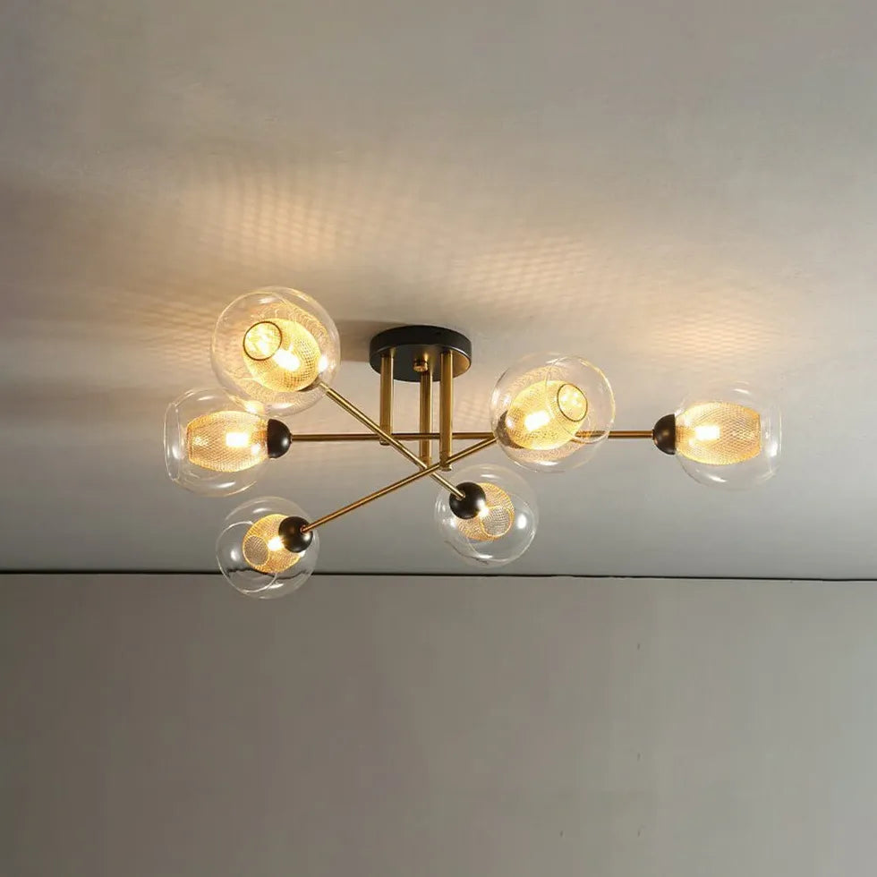 Kroonluchter glazen bollen gouden woonkamer