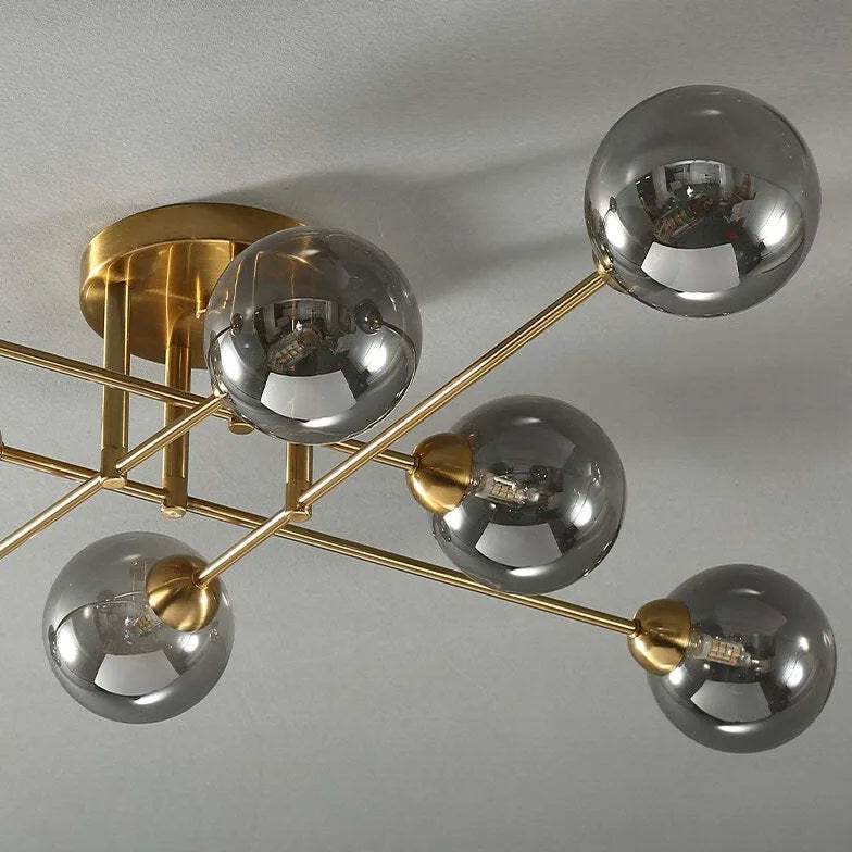 Kroonluchter glazen bollen gouden woonkamer