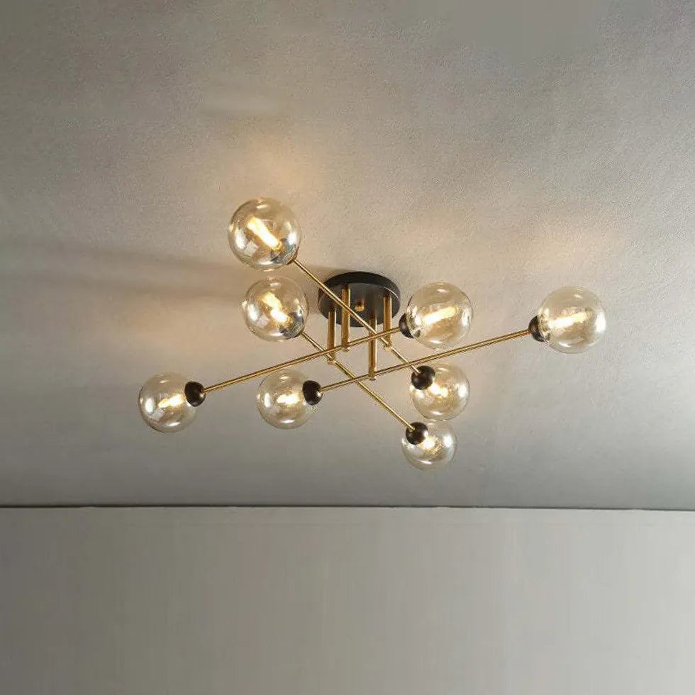 Kroonluchter glazen bollen gouden woonkamer
