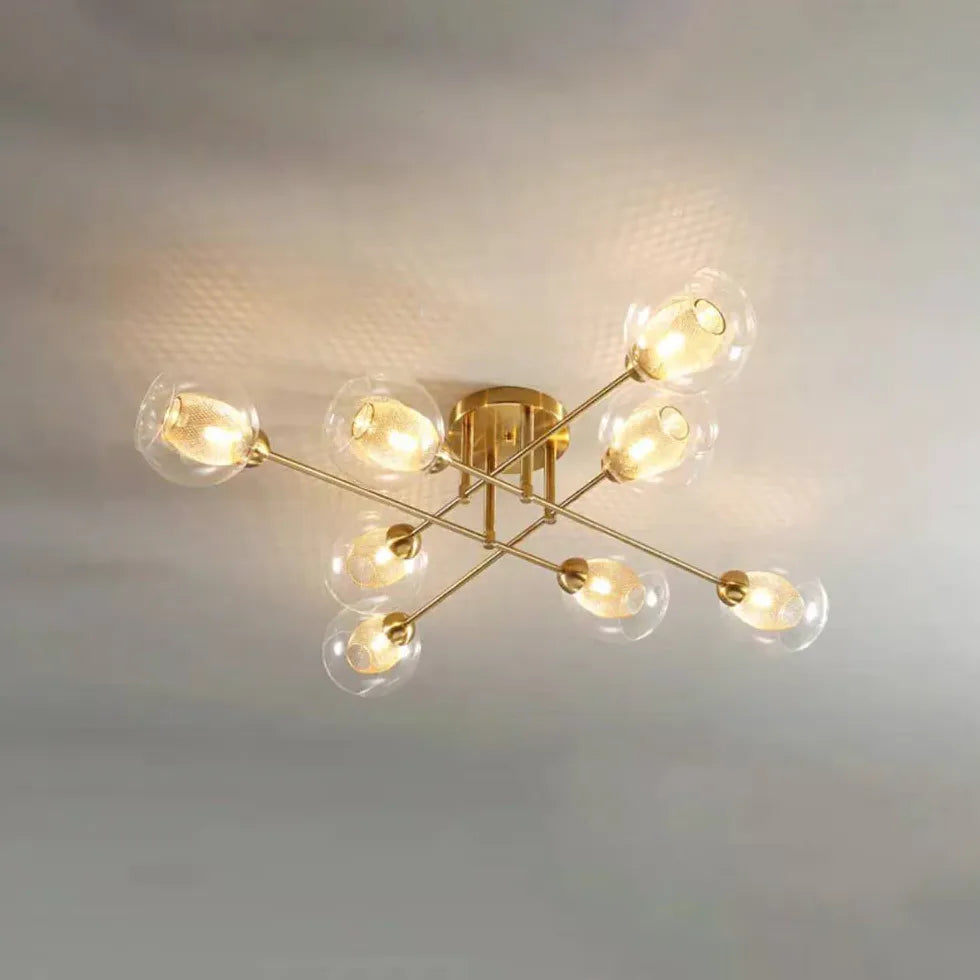 Kroonluchter glazen bollen gouden woonkamer