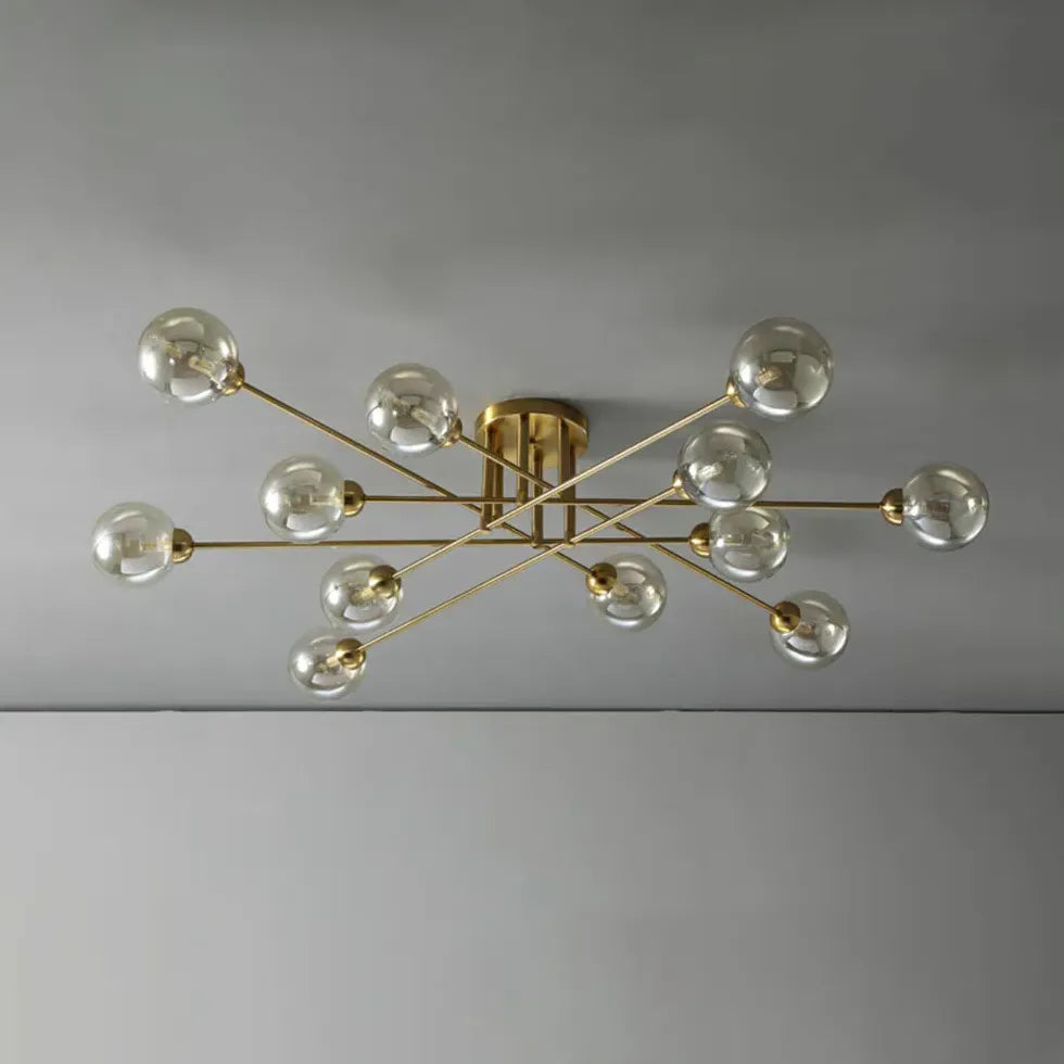 Kroonluchter glazen bollen gouden woonkamer