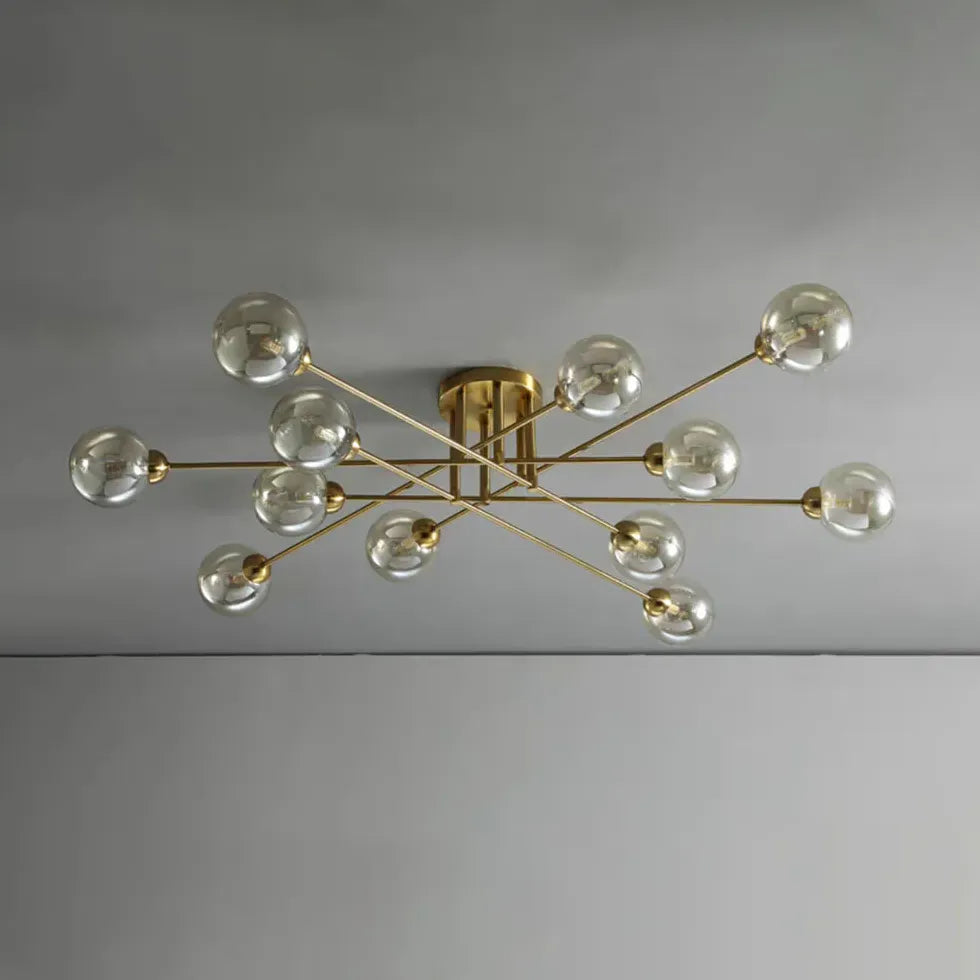 Kroonluchter glazen bollen gouden woonkamer