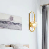 Wandlamp met gouden ovalen frame slaapkamer