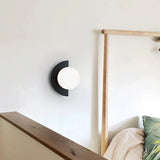 Zwarte wandlamp slaapkamer met moderne halve cirkel