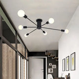 Woonkamer plafond lamp met gouden takken